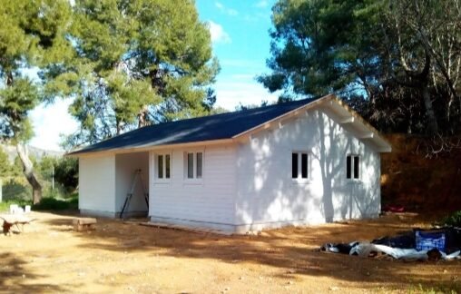 Fachada de madera en vivienda unifamiliar de una planta